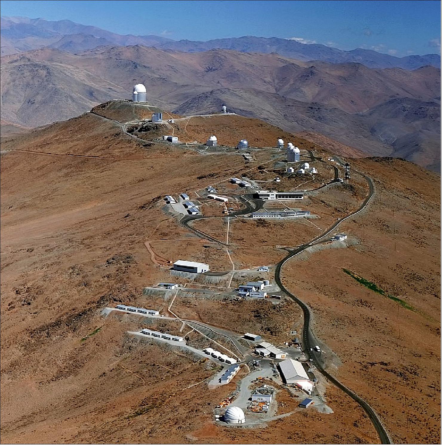 Figure 4: An aerial view of the La Silla site in Chile, ESO's original observing site, located at the outskirts of the Chilean Atacama Desert, 600 km north of Santiago de Chile and at an altitude of 2400 m (image credit: ESO, C. Madsen)