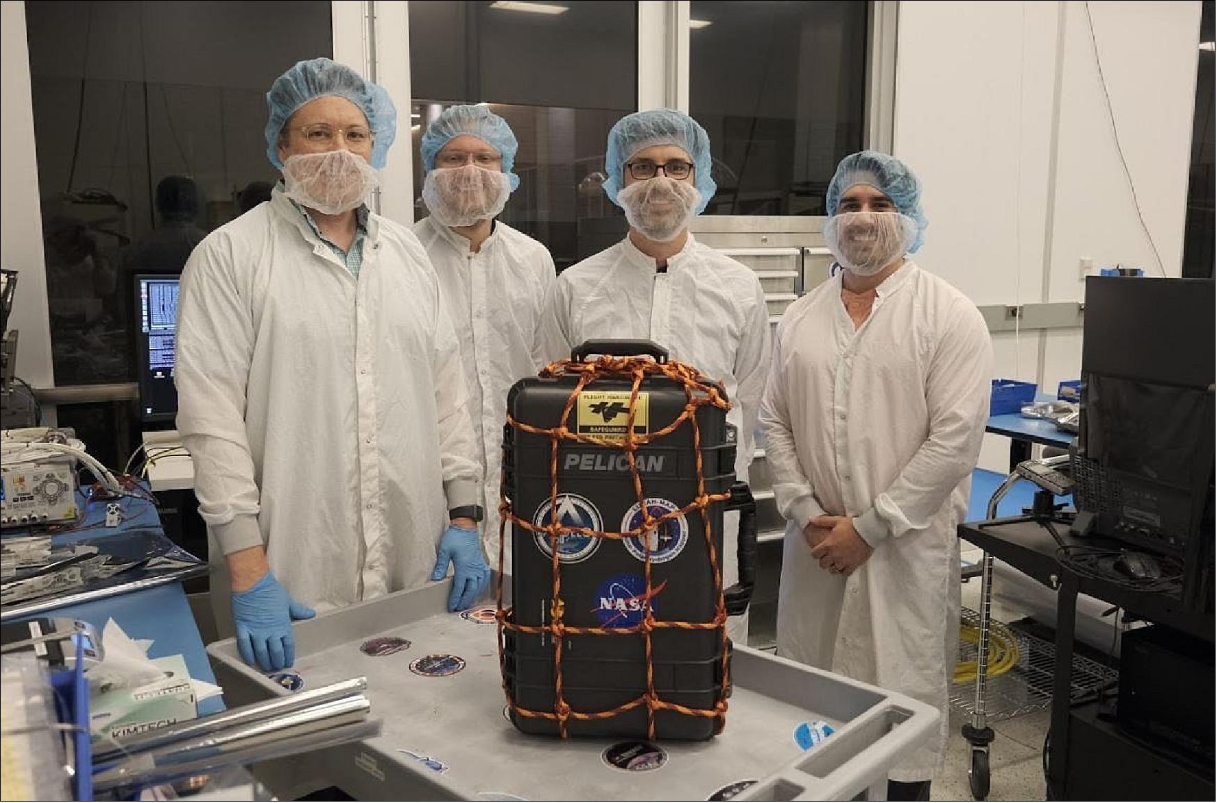 Figure 11: LunaH-Map ready for transport from the ASU Tempe campus to NASA's Kennedy Space Center. Left to right: Joe DuBois, Nathaniel Struebel, Craig Hardgrove and Tyler O'Brien (image credit: ASU)