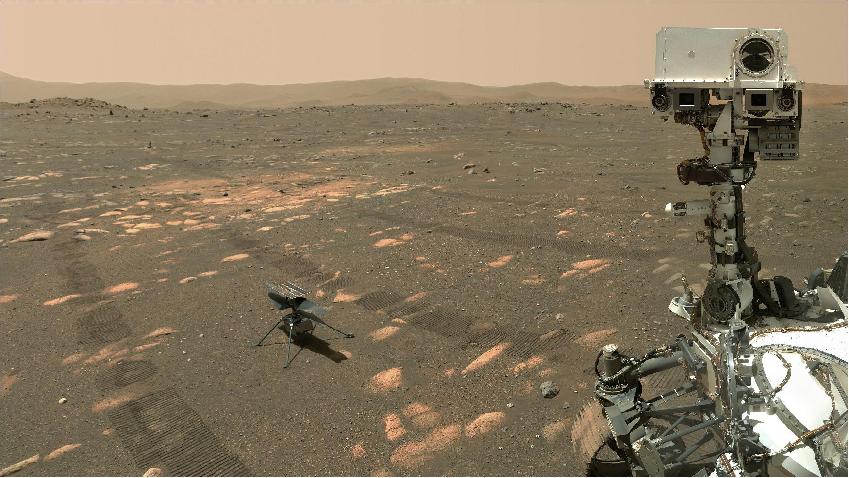 Figure 30: NASA's Perseverance Mars rover took a selfie with the Ingenuity helicopter, seen here about 13 feet (3.9 meters) from the rover in this image taken April 6, 2021, the 46th Martian day, or sol, of the mission by the WATSON (Wide Angle Topographic Sensor for Operations and eNgineering) camera on the SHERLOC (Scanning Habitable Environments with Raman and Luminescence for Organics and Chemicals) instrument, located at the end of the rover's long robotic arm (image credits: NASA/JPL-Caltech/MSSS)
