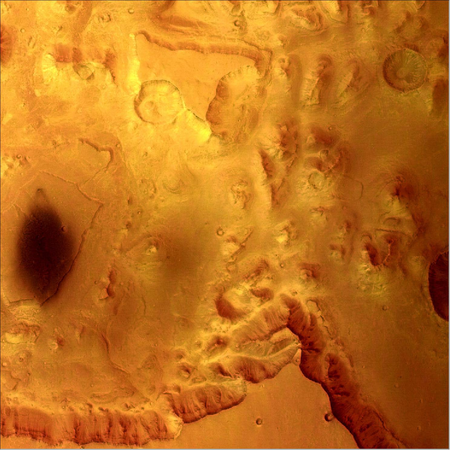 Figure 94: This picture was taken by the HRSC aboard ESA's Mars Express, in color and 3D, during orbit 18 on 14 January 2004 from a height of 275 km. The location is in Valles Marineris at 5º North and 323º East. The area is 50 km across, at a resolution of 12 m/pixel, and shows mesas and cliffs as well as flow features which indicate erosion by the action of flowing water. The landscape is seen in a vertical view, with north at the bottom (image credit: ESA/DLR/FU Berlin (G. Neukum), CC BY-SA 3.0 IGO) 46)