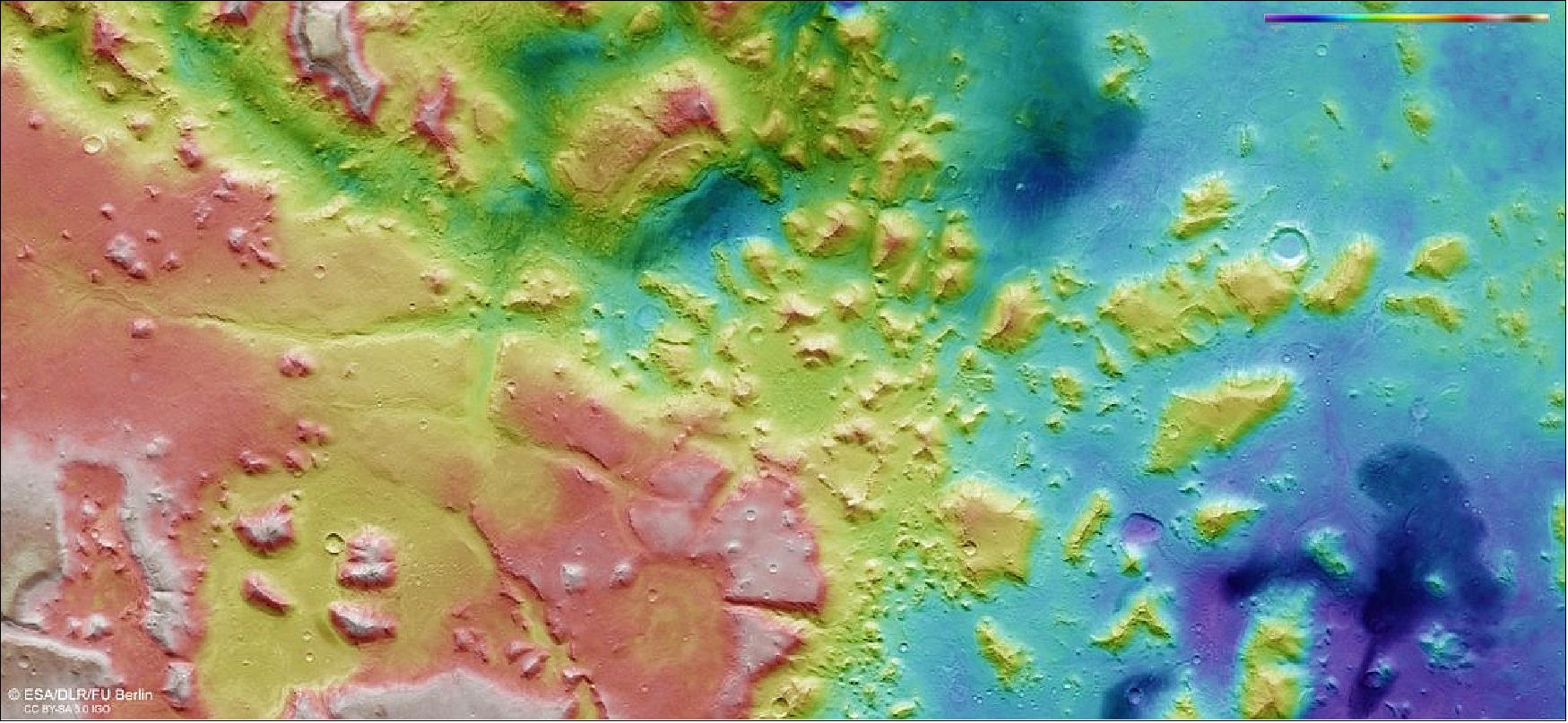 Figure 67: This image shows the relative heights of the landscape in and around Nili Fossae, an escarpment sitting between the northern lowlands and southern highlands of Mars. The lower parts of the surface are shown in blues and purples, while higher-altitude regions show up in whites, browns, and reds, as indicated on the scale to the top right (image credit: ESA/DLR/FU Berlin, CC BY-SA 3.0 IGO)