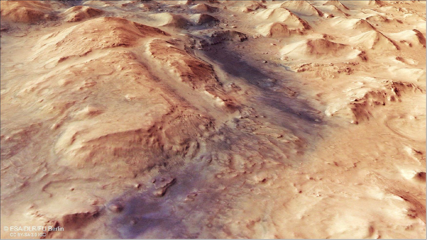 Figure 64: This perspective view shows Nili Fossae, an escarpment sitting between the northern lowlands (lower right) and southern highlands (upper left) of Mars (image credit: ESA/DLR/FU Berlin, CC BY-SA 3.0 IGO)