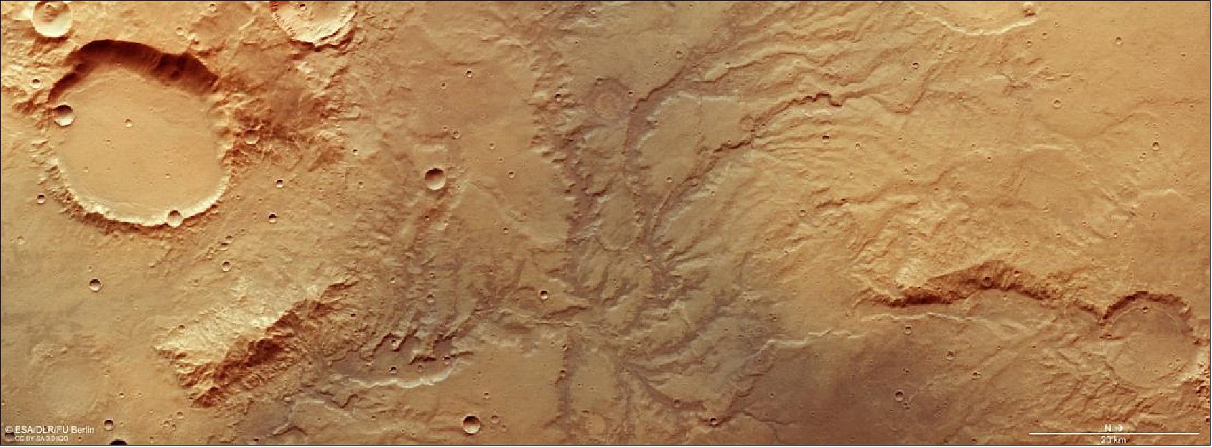 Figure 57: This image from ESA’s Mars Express shows a network of dried-up valleys on Mars, and comprises data gathered on 19 November 2018 during Mars Express orbit 18831. The ground resolution is approximately 14 m/pixel and the images are centered at 66ºE/17ºS. This image was created using data from the nadir and color channels of the High Resolution Stereo Camera (HRSC). The nadir channel is aligned perpendicular to the surface of Mars, as if looking straight down at the surface. North is to the right (image credit: ESA/DLR/FU Berlin, CC BY-SA 3.0 IGO)