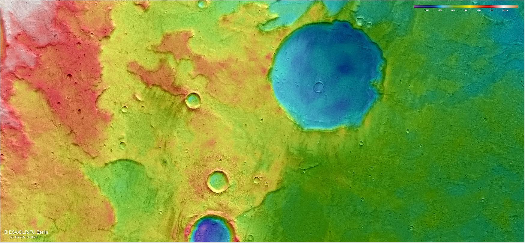 Figure 25: Topographic view of Terra Cimmeria. This color-coded topographic view shows Terra Cimmeria, a region found in the southern highlands of Mars. Lower parts of the surface are shown in blues and purples, while higher altitude regions show up in whites, yellows, and reds, as indicated on the scale to the top right. This view is based on a digital terrain model of the region, from which the topography of the landscape can be derived. It comprises data obtained by the HRSC on Mars Express on 11 December 2018 during orbit 18904. The ground resolution is approximately 13 m/pixel and the images are centered at about 171º East and 40º South. North is to the right (image credit: ESA/DLR/FU Berlin, CC BY-SA 3.0 IGO)