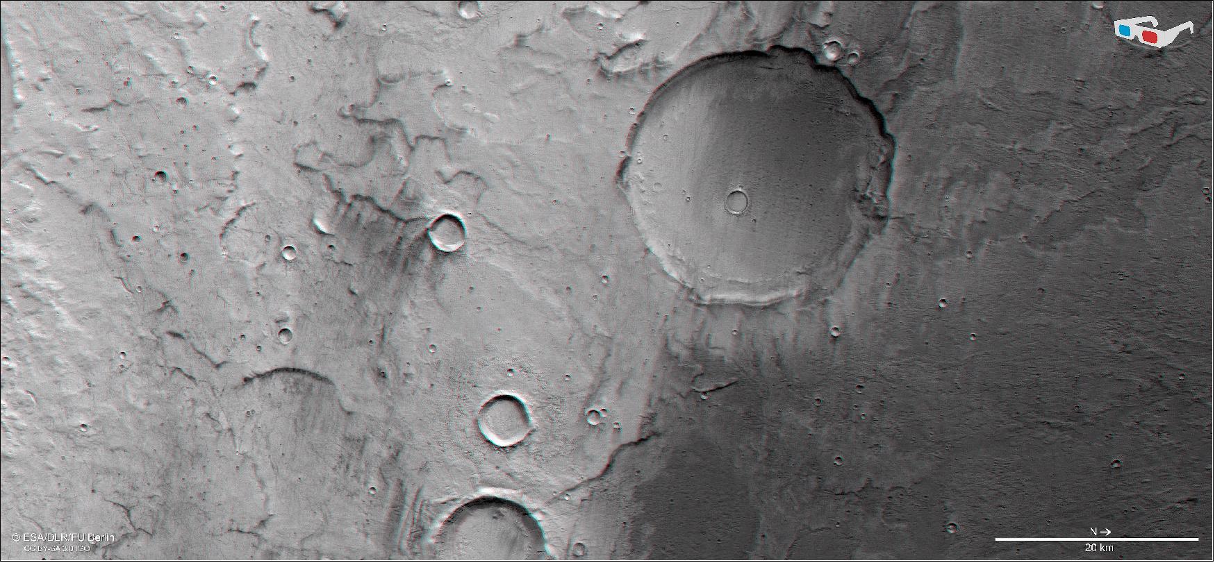 Figure 24: Terra Cimmeria in 3D. This image shows Terra Cimmeria, a region found in the southern highlands of Mars, in 3D when viewed using red-green or red-blue glasses. This anaglyph was derived from data obtained by the nadir and stereo channels of the HRSC on ESA's Mars Express during spacecraft orbit 18904. It covers a part of the martian surface centered at about 171º East and 40º South. North is to the right(image credit: ESA/DLR/FU Berlin, CC BY-SA 3.0 IGO)