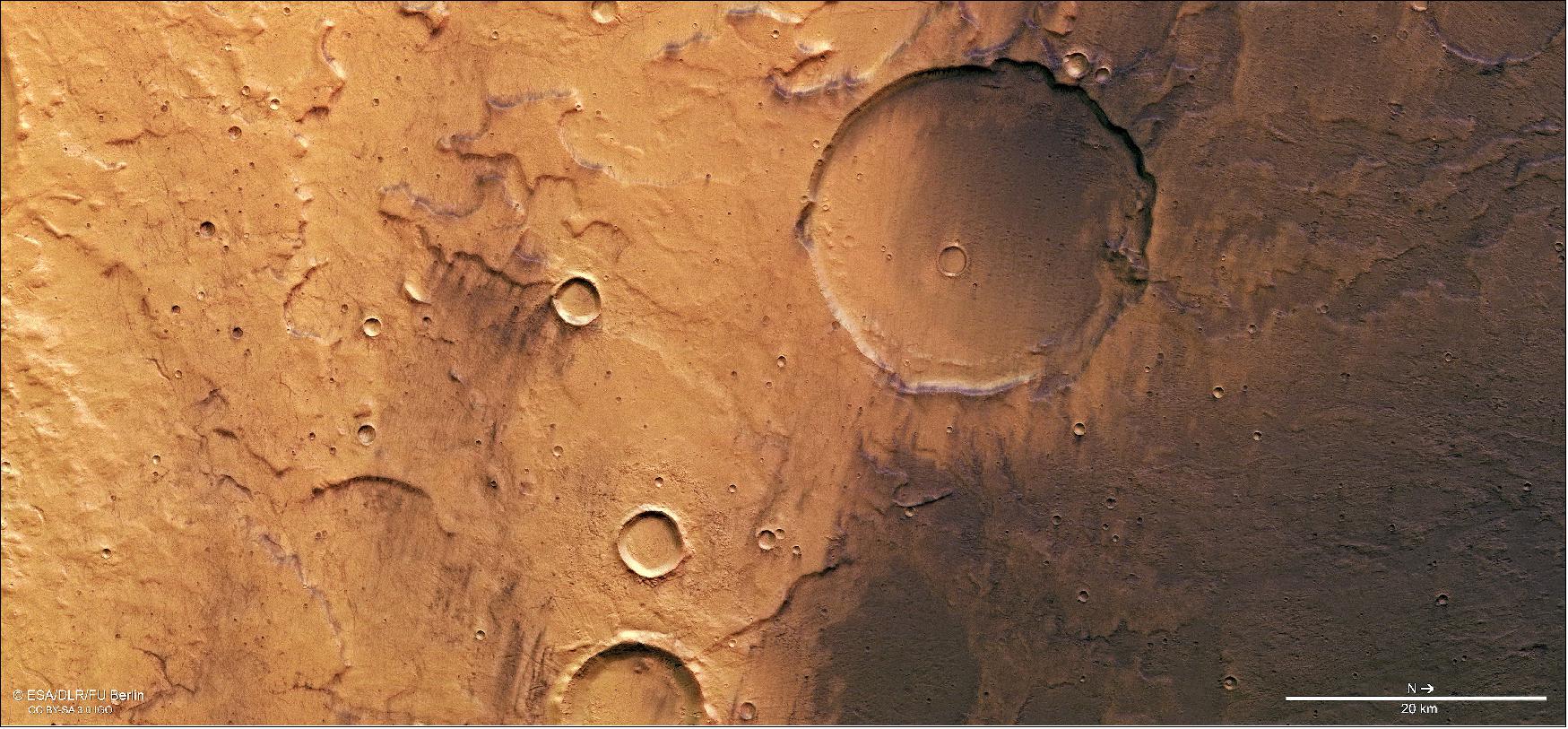 Figure 20: This image from ESA's Mars Express shows Terra Cimmeria, a region found in the southern highlands of Mars. It comprises data gathered on 11 December 2018 during Mars Express orbit 18904. The ground resolution is approximately 13 meters per pixel and the images are centered at about 171º East and 40º South. This image was created using data from the nadir and color channels of the HRSC. The nadir channel is aligned perpendicular to the surface of Mars, as if looking straight down at the surface. North is to the right (image credit: ESA/DLR/FU Berlin, CC BY-SA 3.0 IGO)