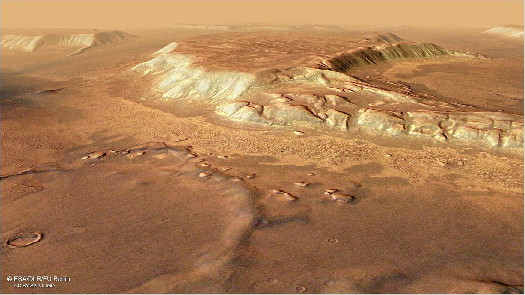 Figure 7: This image from ESA's Mars Express shows a region of Mars named Deuteronilus Mensae. This oblique perspective view was generated using a digital terrain model and Mars Express data gathered on 25 February 2018 during orbit 17913. The ground resolution is approximately 13 m/pixel and the images are centered at about 25.5ºE/44ºN. This image was created using data from the nadir and color channels of the High Resolution Stereo Camera (HRSC). The nadir channel is aligned perpendicular to the surface of Mars, as if looking straight down at the surface (image credit: ESA/DLR/FU Berlin, CC BY-SA 3.0 IGO)