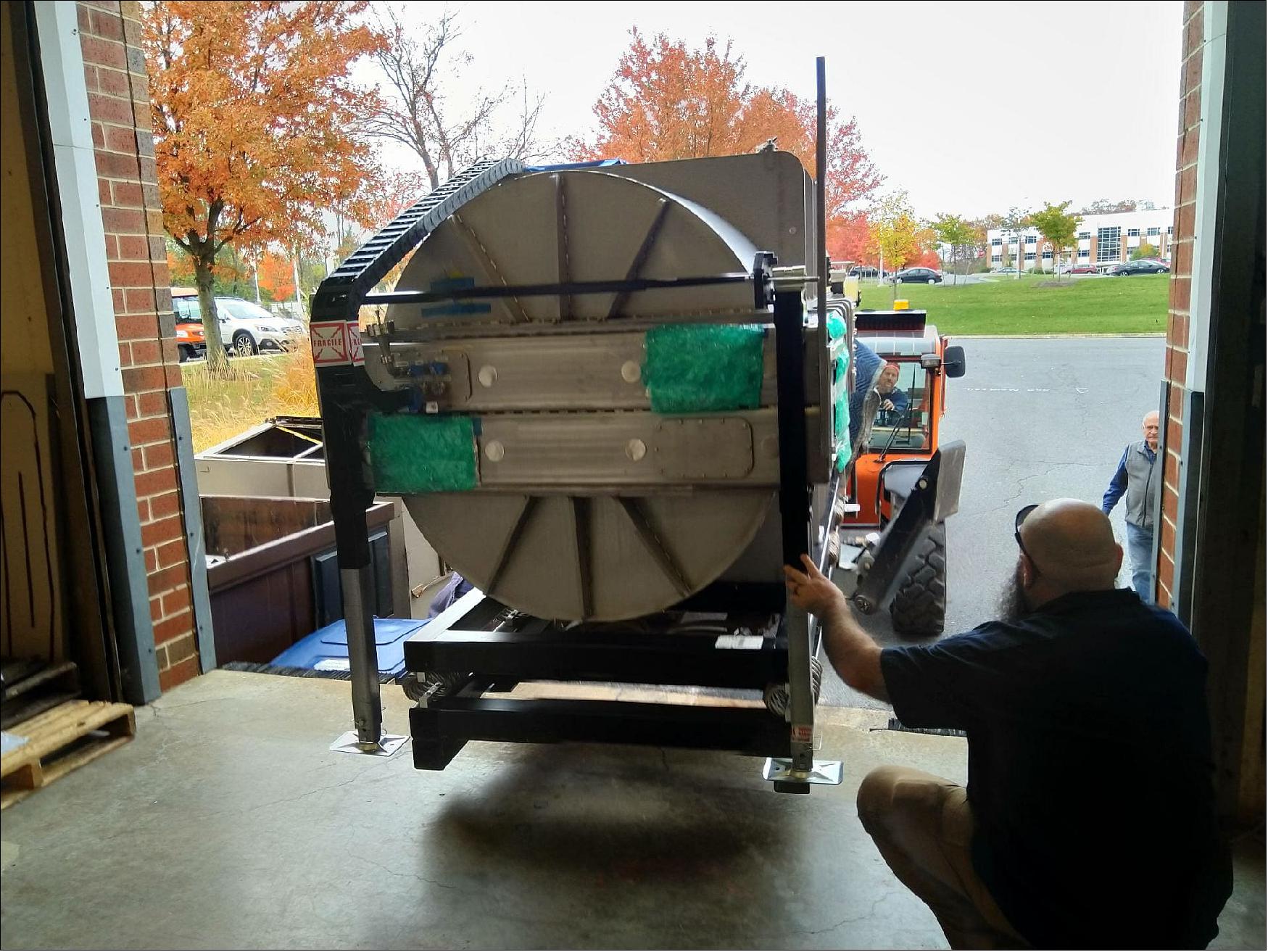 Figure 10: NEID instrument package lift off the loading dock (image credit: PSU)