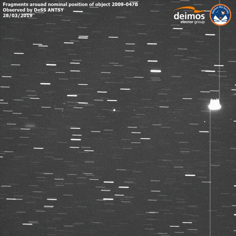 Figure 37: Rocket body fragments from the object 2009-047B. In the clip, a number of small point-like fragments can be seen spread horizontally across the frame. As the observatory moves with the debris objects, the background stars are seen as white streaks. The remnant piece is clearly visible as the largest and brightest point at the center of about 40-60 smaller pieces, many larger than 30 cm in size, and has been traced back to the upper stage of a rocket launched in September 2009 (image credit: Deimos Sky Survey)