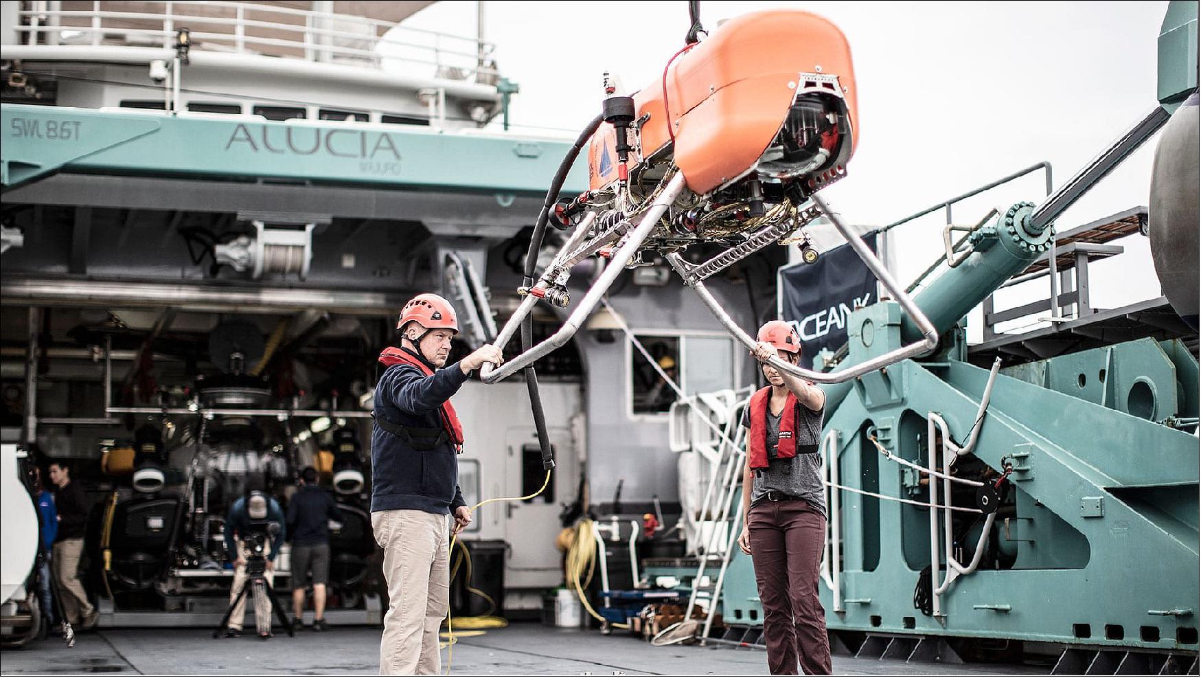 Figure 3: Orpheus was first tested in September 2018 with the ocean exploration organization OceanX and in September 2019 from the WHOI-operated research vessel Neil Armstrong. Each test offered the opportunity to move to successively greater depths and to complete more complex missions (image credit: WHOI)