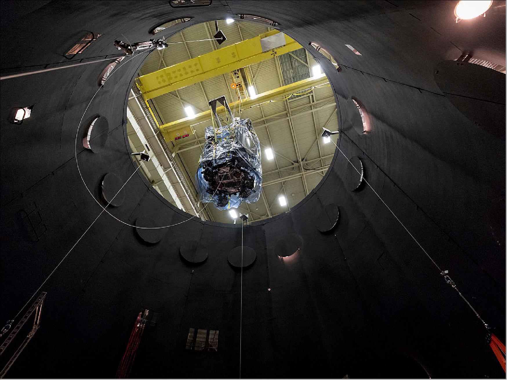 Figure 128: NASA’s Parker Solar Probe descends into the thermal vacuum chamber at NASA’s Goddard Space Flight Center. The spacecraft will be inside the chamber for about seven weeks (image credit: NASA, JHU/APL, Ed Whitman)