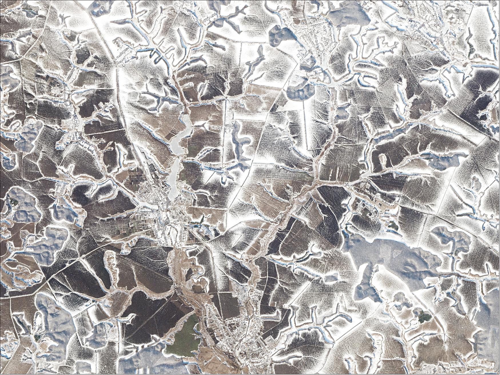 Figure 43: This Flock-1 image, acquired on 17 February 2016, shows icy fields during winter in Sumy Oblast, Ukraine (image credit: Planet Labs)