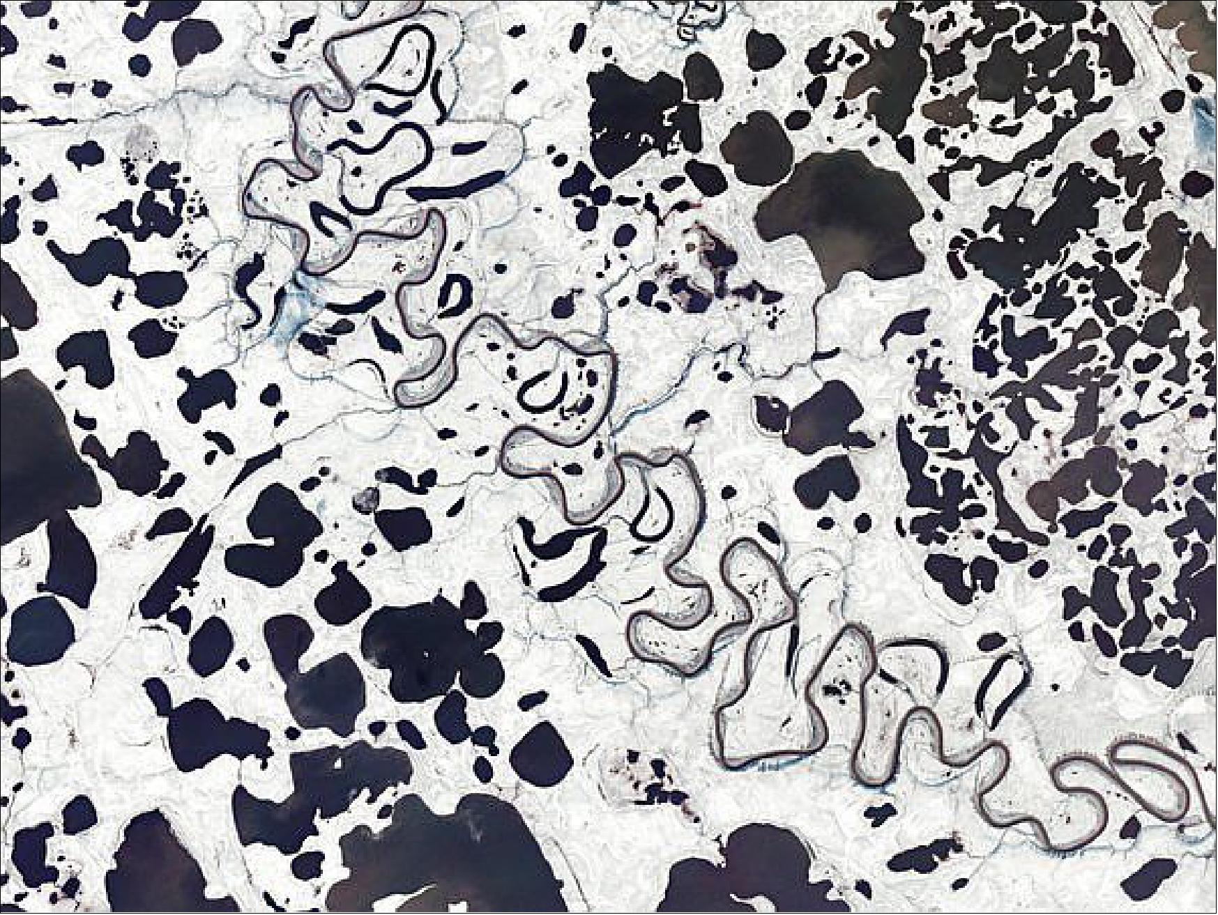 Figure 39: The meandering Yukon River is seen in this Flock-1 image from 19 September 2016. Notice in particular how the September snows cover the landscape, but the various bodies of water are still free of ice (image credit: Planet Labs, eoPortal team)