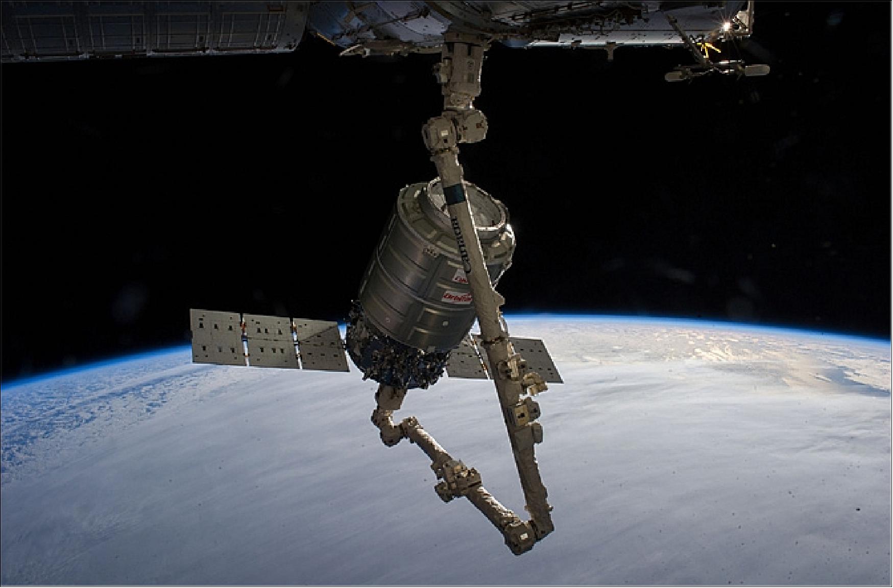 Figure 18: Image of Cygnus grappling with Canadarm2 and berthing to the ISS (image credit: NASA)