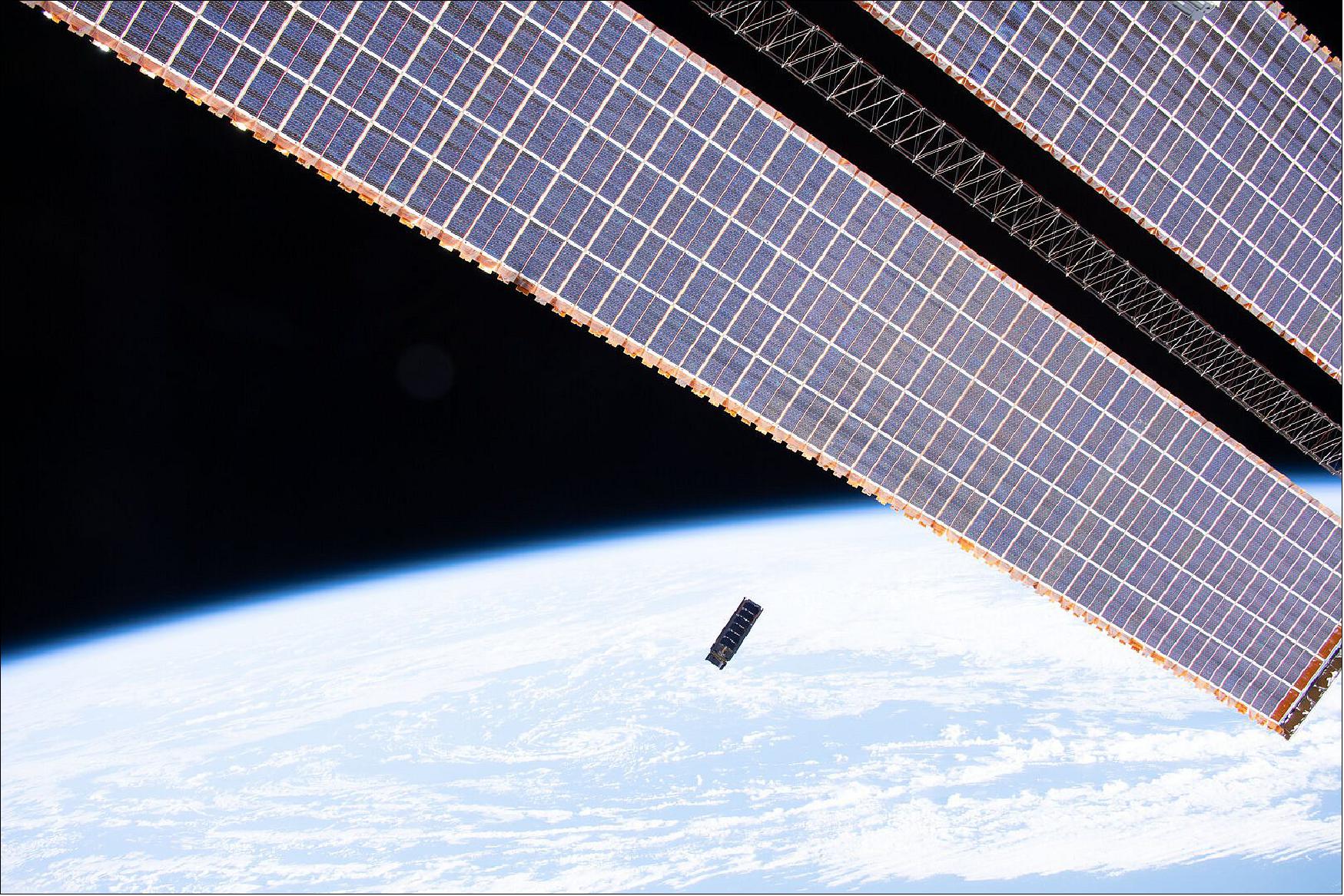 Figure 3: The moment ESA's latest mission left the International Space Station: the Qarman reentry CubeSat developed with Belgium's Von Karman Institute was deployed by NASA astronaut Andrew 'Drew' Morgan via a Nanoracks dispenser on 19 February 2020. Qarman will now fall gradually to Earth, to eventually gather valuable data on atmospheric reentry physics (image credit: NASA)