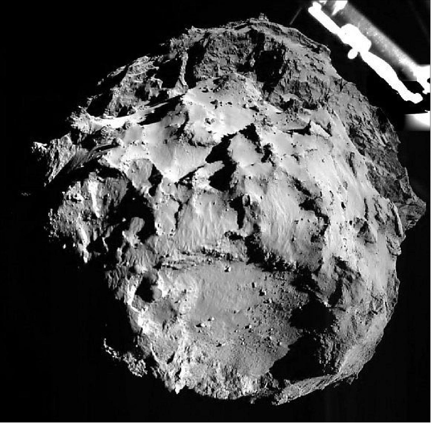 Figure 160: First photo released of Comet 67P/C-G taken by the ROLIS camera of Philae during its descent on Nov. 12 at 14:38:41 UTC from a distance of ~3 km from the surface. The landing site is imaged with a resolution of about 3 m per pixel (image credit: DLR) 241)