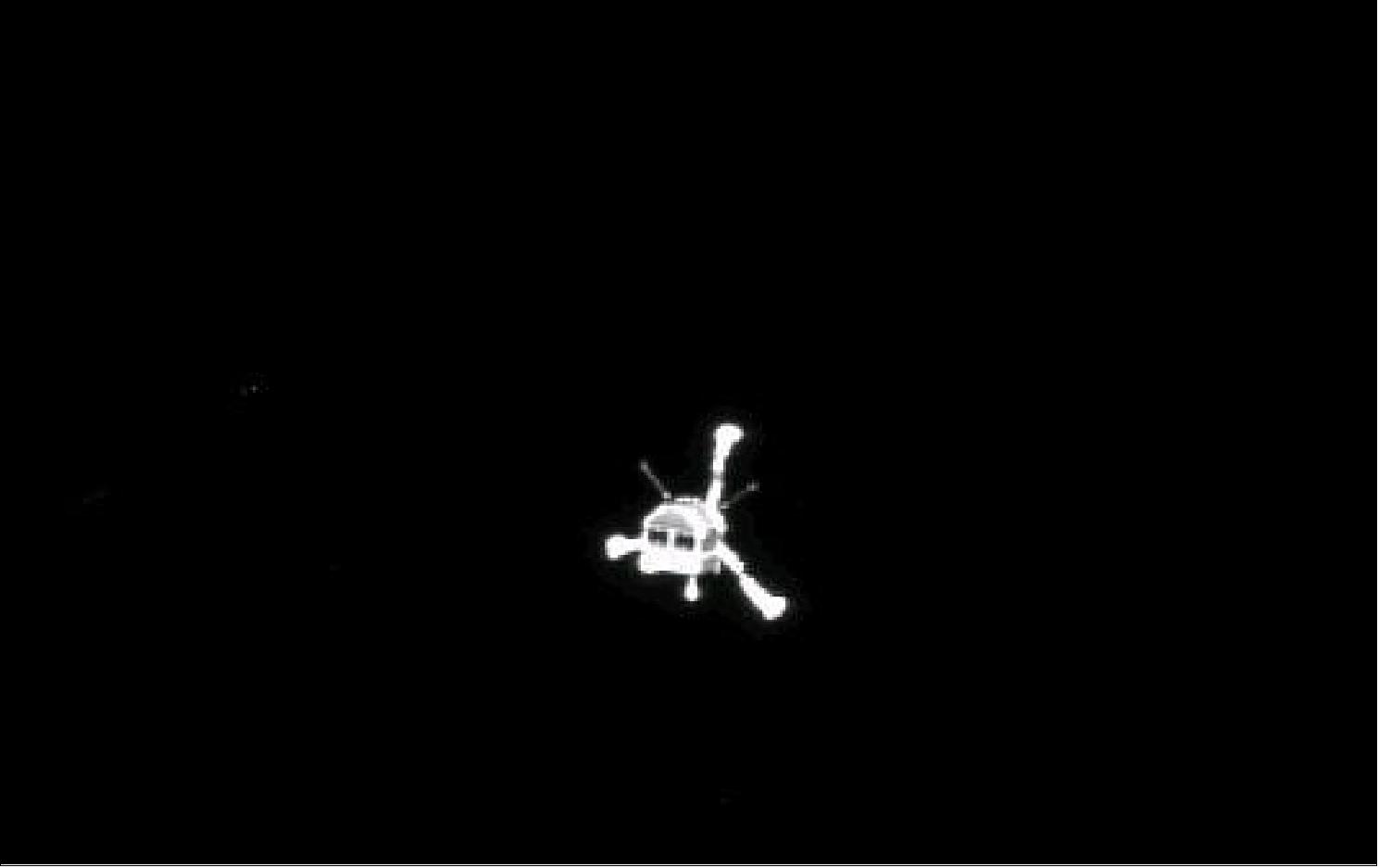 Figure 159: Rosetta’s OSIRIS narrow-angle camera captured this parting shot of the Philae lander after separation (image credit: ESA, Rosetta,MPS for OSIRIS Team MPS, UPD, LAM, IAA, SSO, INTA, UPM, DASP, IDA) 240)