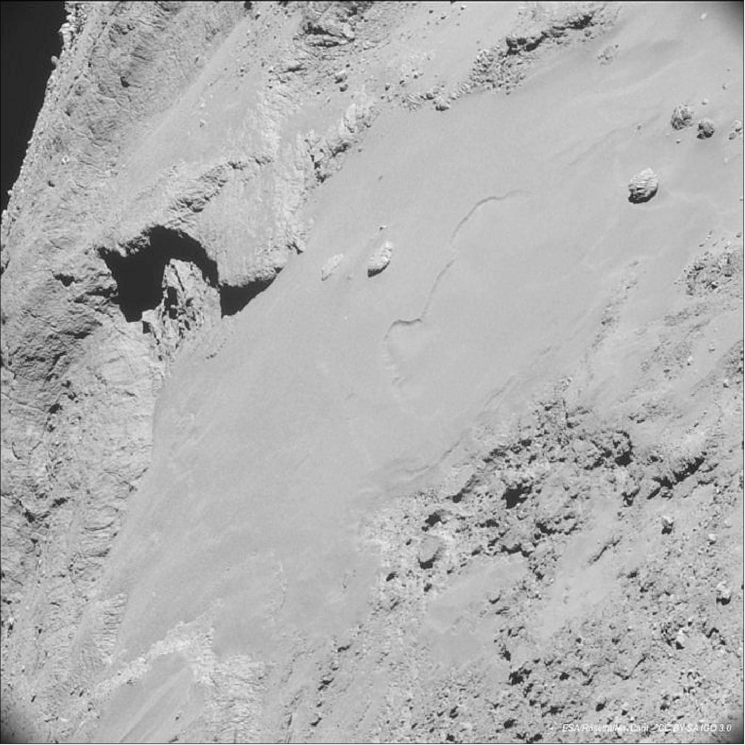 Figure 146: The surface of Comet 67P/C acquired on 14 February with NavCam from 8.7 km (image credit: ESA/Rosetta/NavCam, CC BY-SA IGO 3.0)