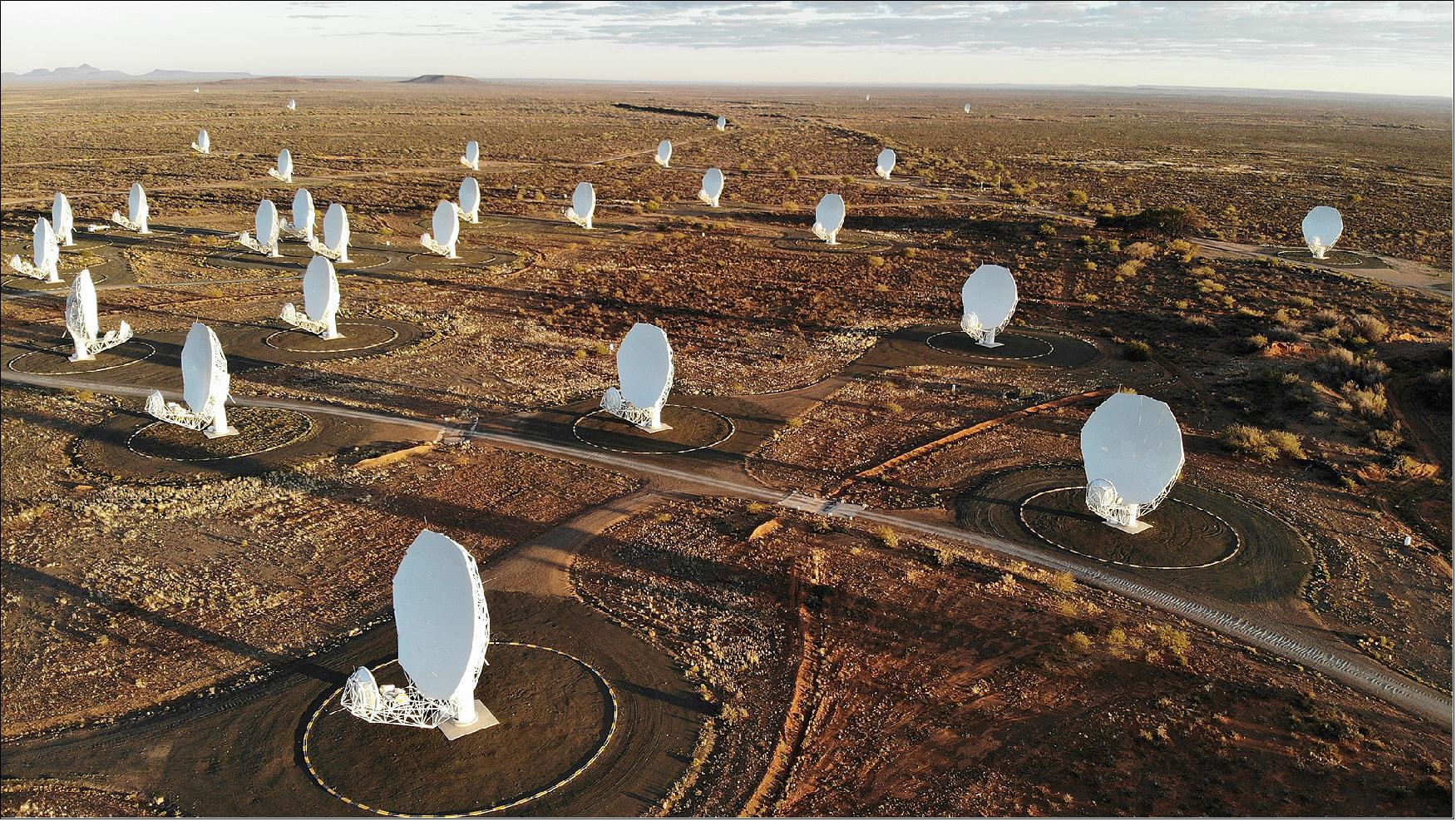 Figure 80: Partial view of the 64-antenna MeerKAT radio telescope which will be incorporated into Phase 1 of the SKA-MID telescope (image credit: SARAO)
