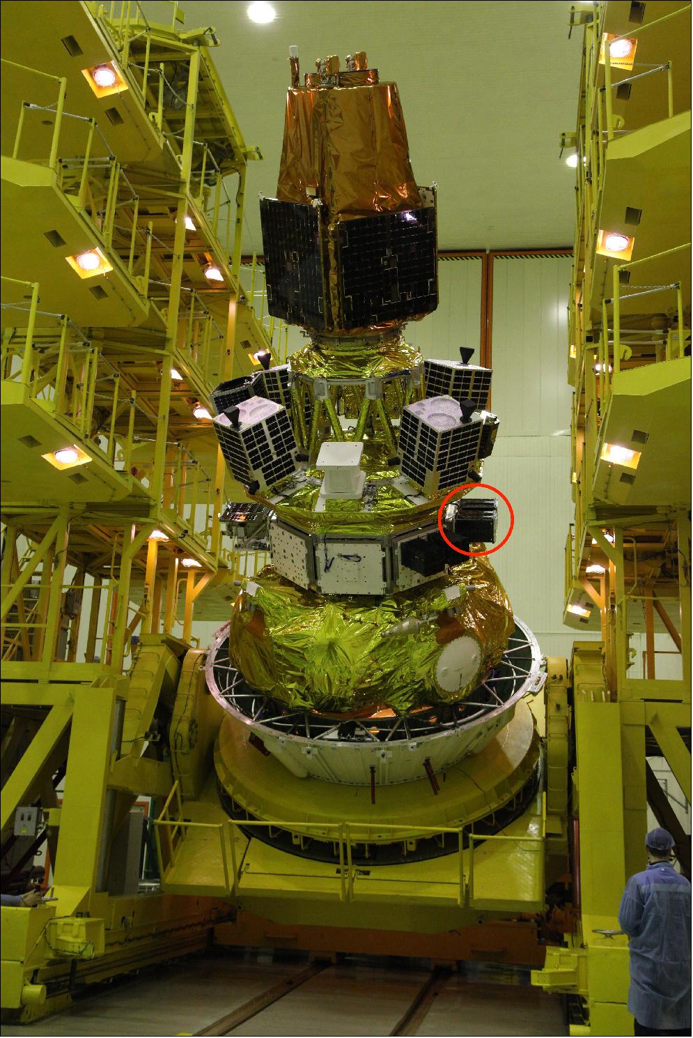Figure 5: Image of the payload of the Soyuz 2 rocket, with the nanosatellite “Enxaneta” attached to it (marked with a red circle), image credit: GK Launch Services