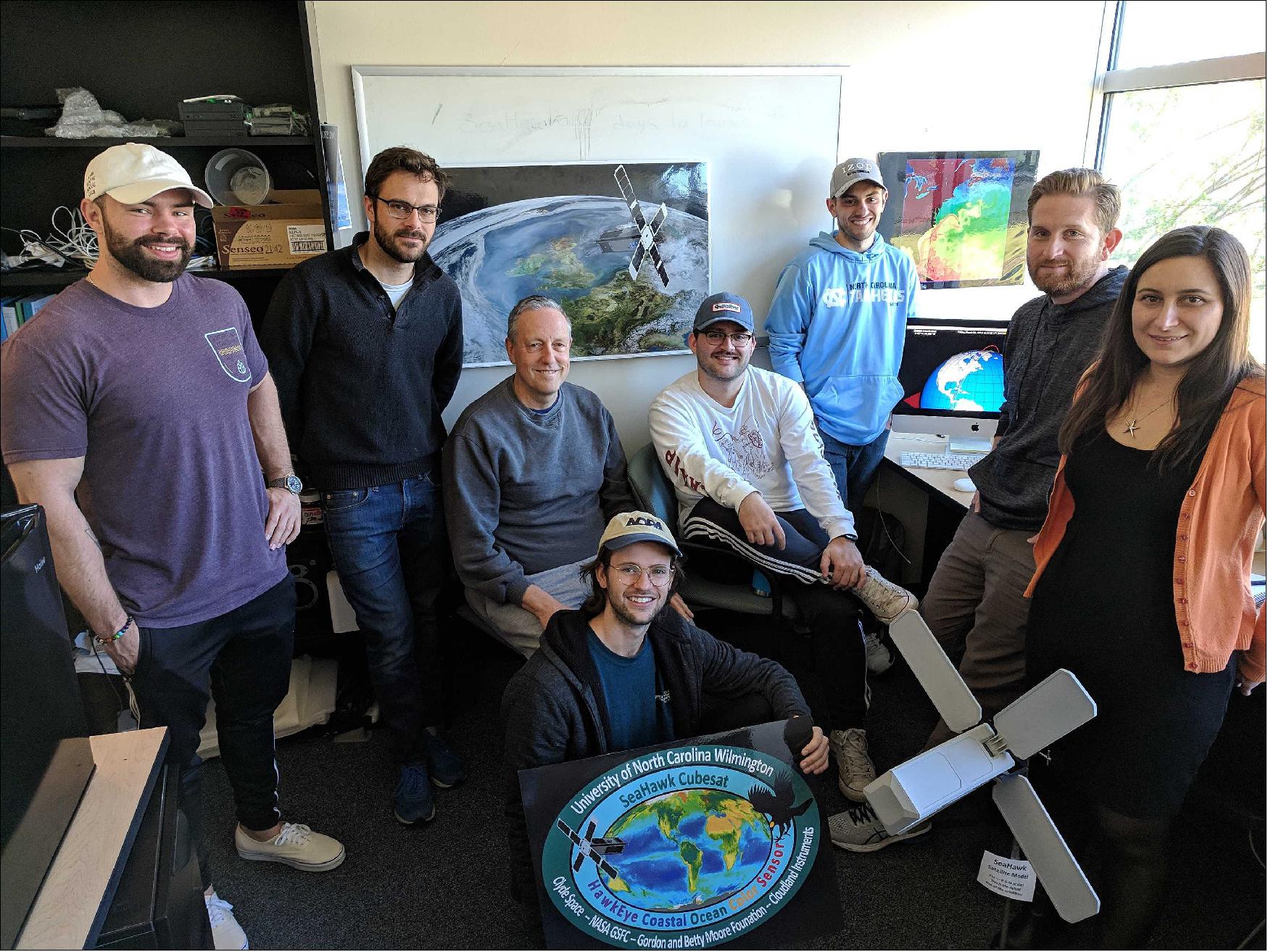 Figure 18: Faculty members Prof. Till Wagner, Prof. Frederick Bingham and Dr. Sara Rivero Calle celebrating the succesful retrieval of SeaHawk-1's first light image with the students from UNCW's CubeSat Lab (image credit: UNCW)