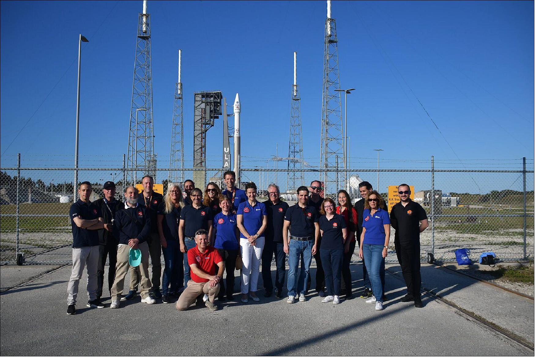 Figure 13: The ESA Solar Orbiter team, along with ESA Director of Science Günther Hasinger (eighth from the right), at the launch pad at NASA's Kennedy Space Center in Florida, US, on Sunday 9 February 2020. In the background, the Atlas V 411 rocket that would lift the spacecraft into space several hours later(photo credit: ESA, P. Olivier)