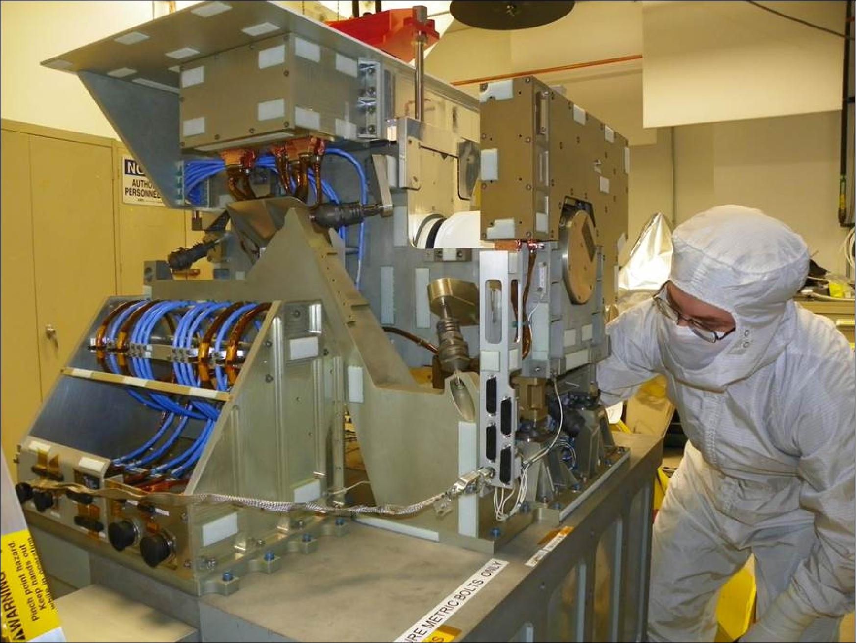 Figure 39: An engineer works on the CrIS instrument for the JPSS-2 satellite, which is slated to launch in March 2022. The CrIS instrument also flies on the Suomi-NPP satellite, and was recently restored to full capability after getting damaged while on orbit (image credit: L3Harris Technologies)