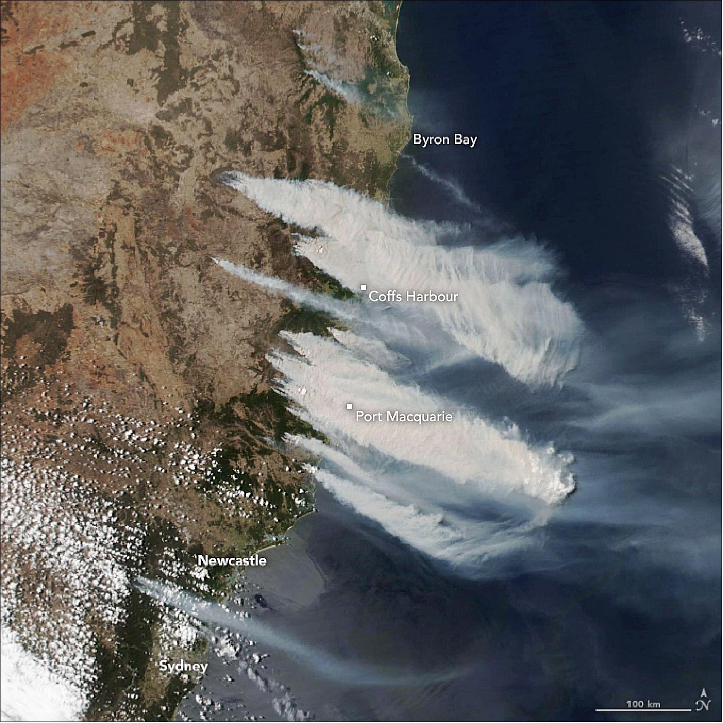 Figure 34: Dry, hot, windy conditions persist as bushfires burn in the eastern part of the Australian state. The recent spate of fires is visible in this image, acquired at 2:30 p.m. local time on November 8, 2019, by the VIIRS (Visible Infrared Imaging Radiometer Suite) on the NOAA-NASA Suomi NPP satellite. The fires burned near the coast from north of Sydney to the border with Queensland, with thick smoke blowing southeast over the Tasman Sea (image credit: NASA Earth Observatory, image by Lauren Dauphin, using VIIRS data from NASA EOSDIS/LANCE and GIBS/Worldview, and the Suomi National Polar-orbiting Partnership. Story by Kathryn Hansen)