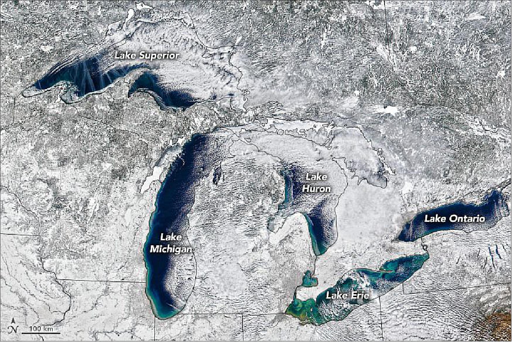 Figure 24: Blue-green open water was still widely visible on February 14, 2020, when the Visible Infrared Imaging Radiometer Suite (VIIRS) on the NOAA-NASA Suomi NPP satellite acquired the natural-color image. Most of the white areas are snow and clouds, but a close look along parts of the shorelines—particularly Lake Superior—reveals small patches ice (image credit: NASA Earth Observatory, image by Joshua Stevens, using VIIRS data from NASA EOSDIS/LANCE and GIBS/Worldview and the Suomi NPP, and ice cover data from NOAA/Great Lakes Environmental Research Laboratory. Story by Kathryn Hansen)