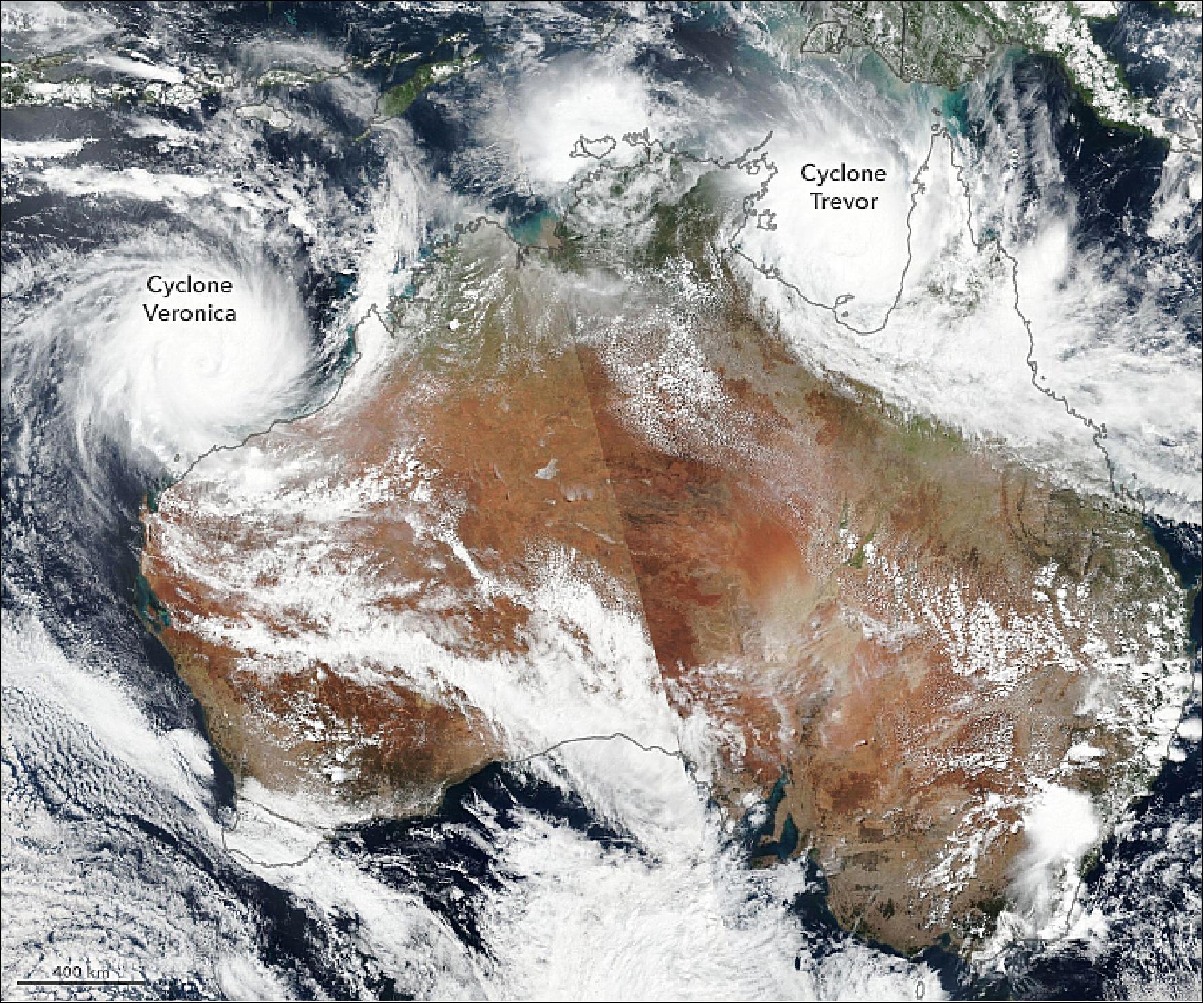 Figure 57: On March 22, 2019, VIIRS (Visible Infrared Imaging Radiometer Suite) on the Suomi NPP satellite acquired the data to make this composite image. The seam line across Australia marks the edge of two different early afternoon satellite passes over the continent. At the time of the image, cyclones Trevor and Veronica both had sustained winds of roughly 175 km/hr (image credit: NASA Earth Observatory, image by Lauren Dauphin, using VIIRS data from Suomi NP, story by Mike Carlowicz)