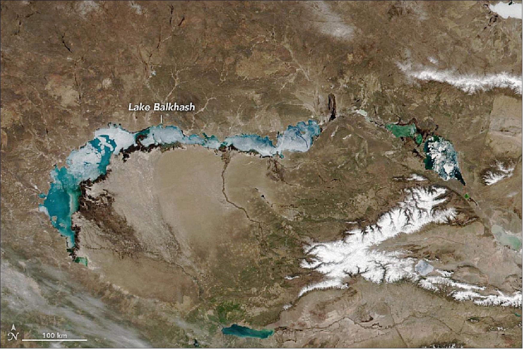Figure 52: Lake Balkhash, spanning about 17,000 km2 (6,600 square miles) in southeastern Kazakhstan, is one of Asia’s largest lakes. Despite the lake’s large size, winters are harsh enough to keep the lake frozen over from November through March. By April 8, 2019, when the Visible Infrared Imaging Radiometer Suite (VIIRS) on Suomi NPP acquired this image, the spring thaw was underway. Images from just a week before show the lake almost entirely covered with ice (image credit: NASA Earth Observatory, image by Lauren Dauphin, using VIIRS data from the Suomi National Polar-orbiting Partnership. Story by Kathryn Hansen)