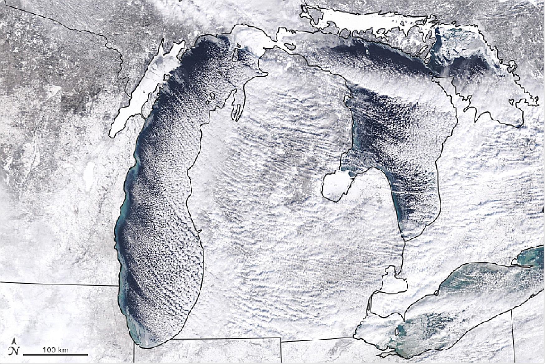 Figure 57: You can almost feel that cold in this natural-color image, acquired on January 27, 2019, by MODIS (Moderate Resolution Imaging Spectroradiometer) on NASA’s Terra satellite. Cloud streets and lake-effect snow stretch across the scene, as frigid Arctic winds blew over the Great Lakes (image credit: NASA Earth Observatory, image by Joshua Stevens, using MODIS data from NASA EOSDIS/LANCE and GIBS/Worldview. Story by Michael Carlowicz)