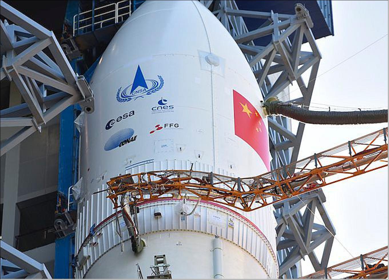 Figure 5: Logos for ESA (European Space Agency), the French space agency CNES, Argentina’s space agency CONAE, and the Austrian Research Promotion Agency (FFG) are installed on the Long March 5’s payload fairing (image credit: China National Space Administration)